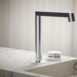 Rocker bathroom sink faucet handle