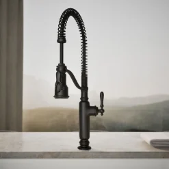 Semi-professional kitchen sink faucet with three-function sprayhead