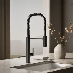 Semi-professional kitchen sink faucet with three-function sprayhead