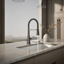 Semi-professional kitchen sink faucet with three-function sprayhead