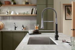 Semi-professional pull-down kitchen sink faucet with three-function sprayhead