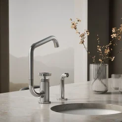 Single-handle bar sink faucet with two-function extended-reach spout and side sprayer
