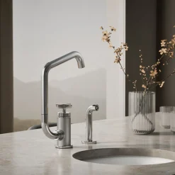 Single-handle bar sink faucet with two-function extended-reach spout and side sprayer