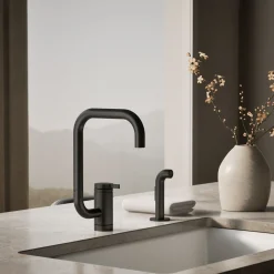 Single-handle kitchen sink faucet with two-function extended-reach spout and side sprayer