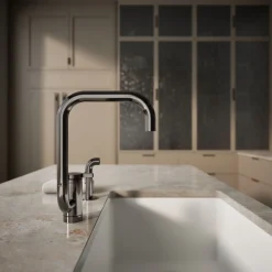Single-handle kitchen sink faucet with two-function extended-reach spout and side sprayer