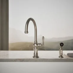 Single-handle kitchen sink faucet with two-function sprayhead