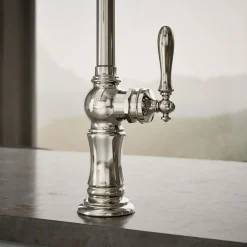 Single-handle kitchen sink faucet with two-function sprayhead