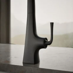 Single-handle kitchen sink faucet with two-function side sprayer