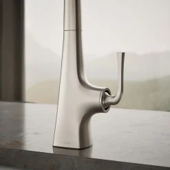 Single-handle kitchen sink faucet with two-function side sprayer