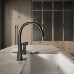Single-handle kitchen sink faucet with two-function side sprayer