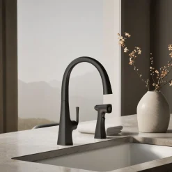 Single-handle kitchen sink faucet with two-function side sprayer