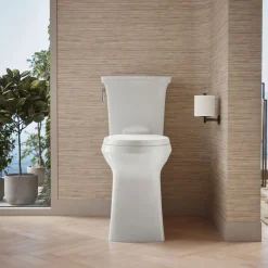 Tall ContinuousClean two-piece elongated toilet with skirted trapway, 1.28 gpf