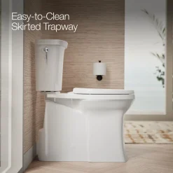 Tall two-piece elongated toilet with skirted trapway, 1.28 gpf