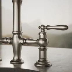 Three-hole bridge bar sink faucet with side sprayer