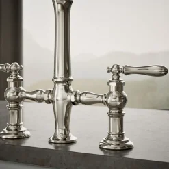 Three-hole bridge kitchen sink faucet with side sprayer
