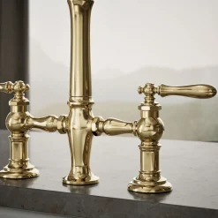 Three-hole bridge kitchen sink faucet with side sprayer
