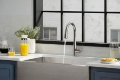 Touchless pull-down kitchen sink faucet with three-function sprayhead