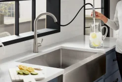Touchless pull-down kitchen sink faucet with three-function sprayhead