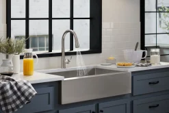 Touchless pull-down kitchen sink faucet with three-function sprayhead