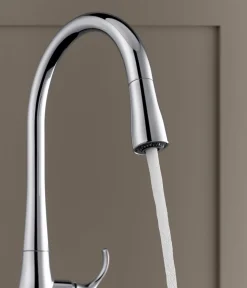 Touchless pull-down kitchen sink faucet with three-function sprayhead