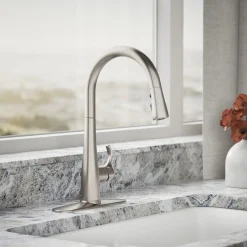 Touchless pull-down kitchen sink faucet with three-function sprayhead