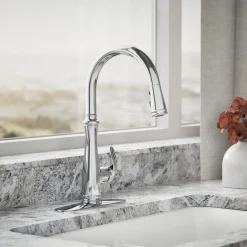 Touchless pull-down kitchen sink faucet with three-function sprayhead