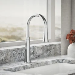 Touchless pull-down kitchen sink faucet with three-function sprayhead