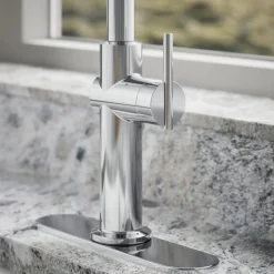 Touchless pull-down kitchen sink faucet with three-function sprayhead