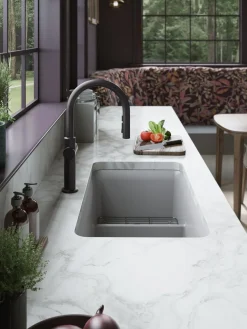 Touchless pull-down kitchen sink faucet with three-function sprayhead