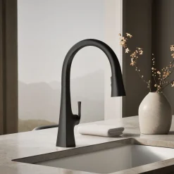 Touchless pull-down kitchen sink faucet with three-function sprayhead