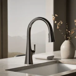Touchless pull-down kitchen sink faucet with three-function sprayhead