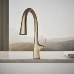 Touchless pull-down kitchen sink faucet with three-function sprayhead