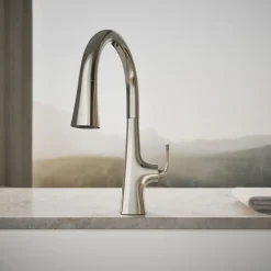 Touchless pull-down kitchen sink faucet with three-function sprayhead