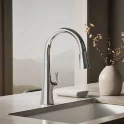 Touchless pull-down kitchen sink faucet with three-function sprayhead