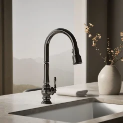 Touchless pull-down kitchen sink faucet with three-function sprayhead