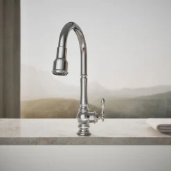 Touchless pull-down kitchen sink faucet with three-function sprayhead