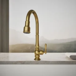 Touchless pull-down kitchen sink faucet with three-function sprayhead