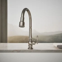 Touchless pull-down kitchen sink faucet with three-function sprayhead
