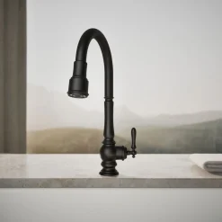 Touchless pull-down kitchen sink faucet with three-function sprayhead
