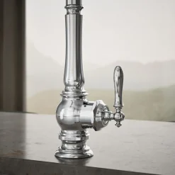 Touchless pull-down kitchen sink faucet with three-function sprayhead