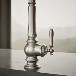 Touchless pull-down kitchen sink faucet with three-function sprayhead
