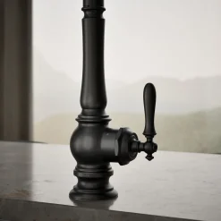 Touchless pull-down kitchen sink faucet with three-function sprayhead