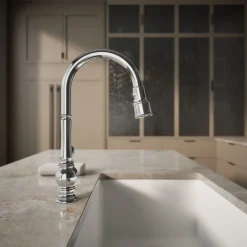 Touchless pull-down kitchen sink faucet with three-function sprayhead