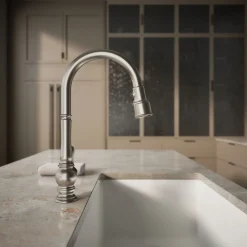 Touchless pull-down kitchen sink faucet with three-function sprayhead