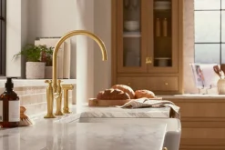 Two-hole bridge kitchen sink faucet with side sprayer