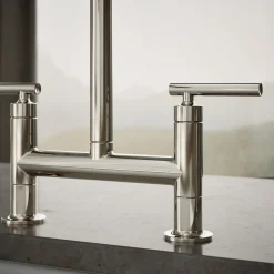 Two-hole bridge kitchen sink faucet with side sprayer