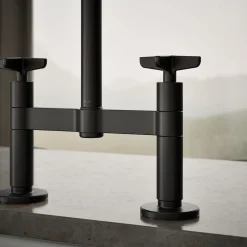 Two-hole bridge kitchen sink faucet with side sprayer