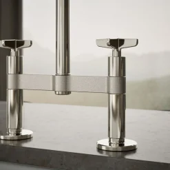 Two-hole bridge kitchen sink faucet with side sprayer