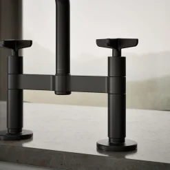 Two-hole bridge kitchen sink faucet with side sprayer
