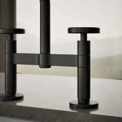 Two-hole bridge kitchen sink faucet with side sprayer